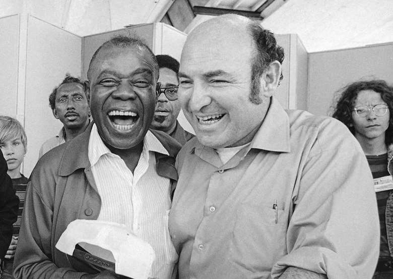 Louis Armstrong and George Wein at Newport Jazz Festival in 1970 - Credit - J Walter Green/Associated Press